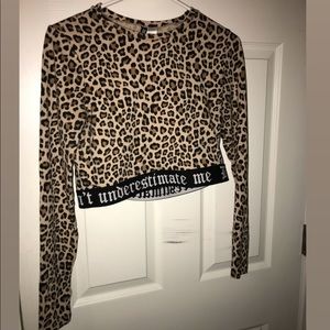 Long sleeved leopard print crop top.